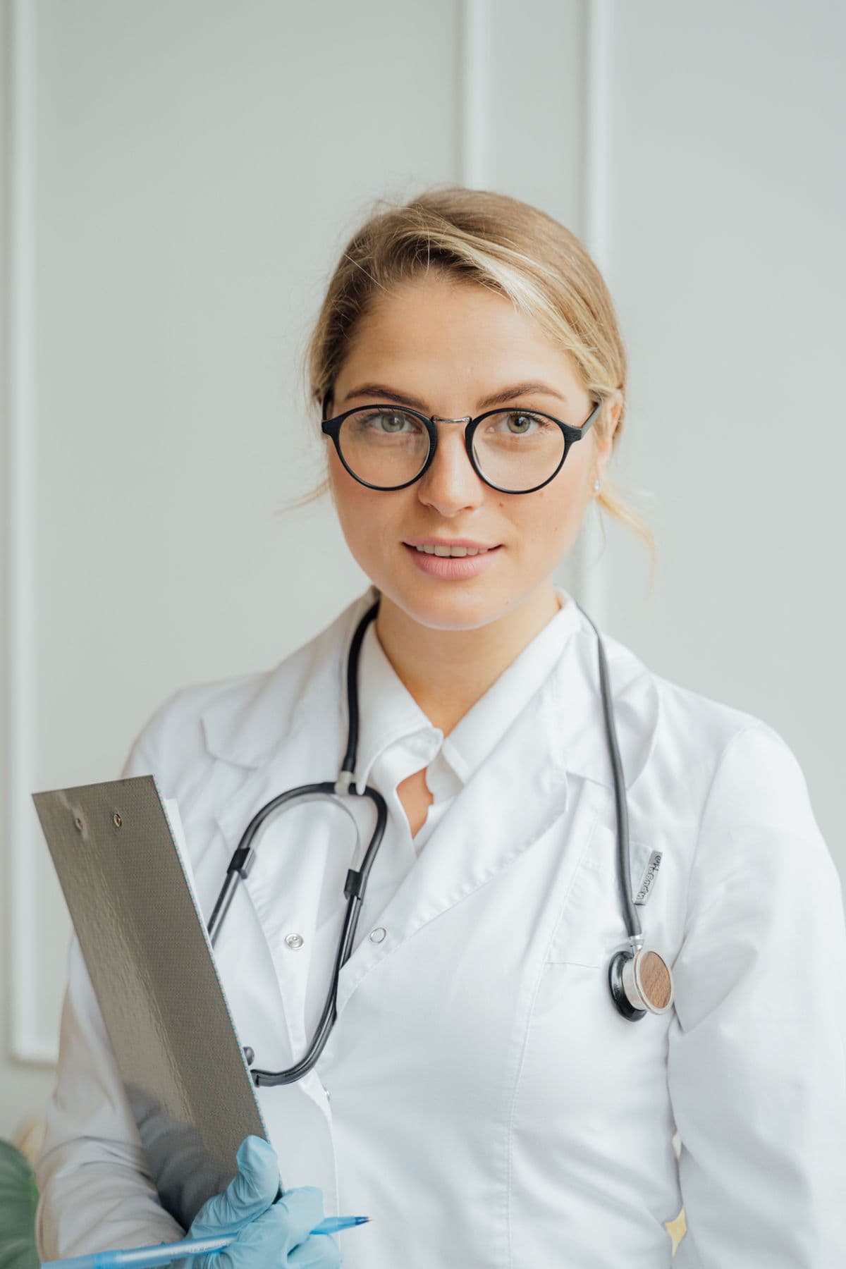 Community health worker consulting with a patient