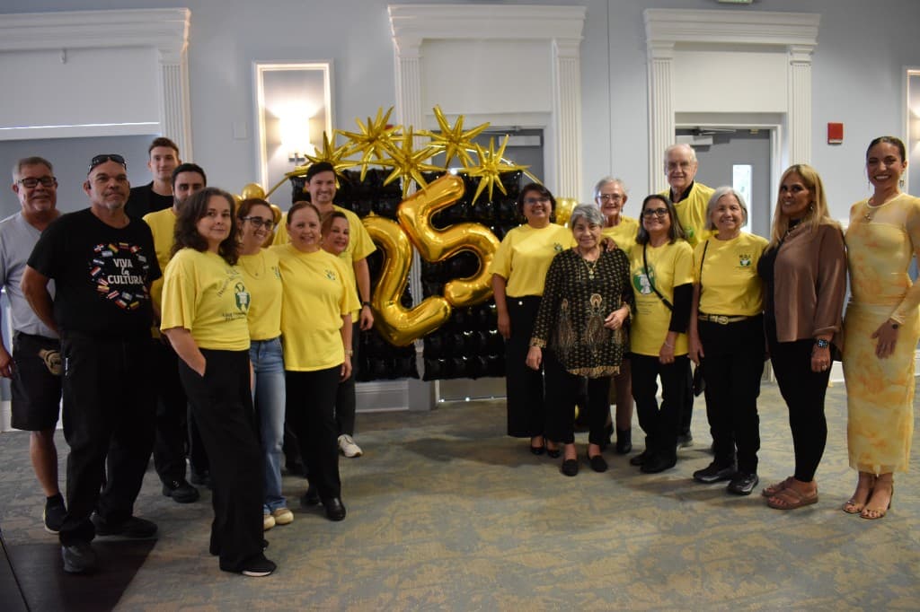 HHI team and community members celebrating the organization's 25th anniversary