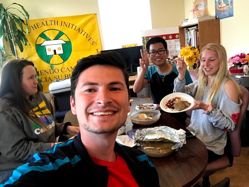 HHI program participants sharing a healthy meal together at a community cooking demonstration
